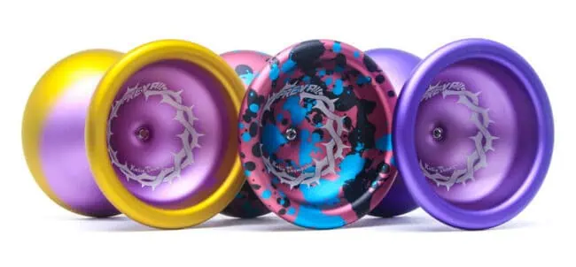 Vibrant YoYoFactory yoyos in yellow, pink, blue, and purple for professional and beginner players.
