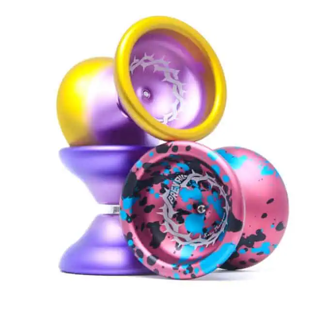 Brightly colored Yo-Yos with vibrant pink, blue, purple, and yellow designs for advanced tricks and.