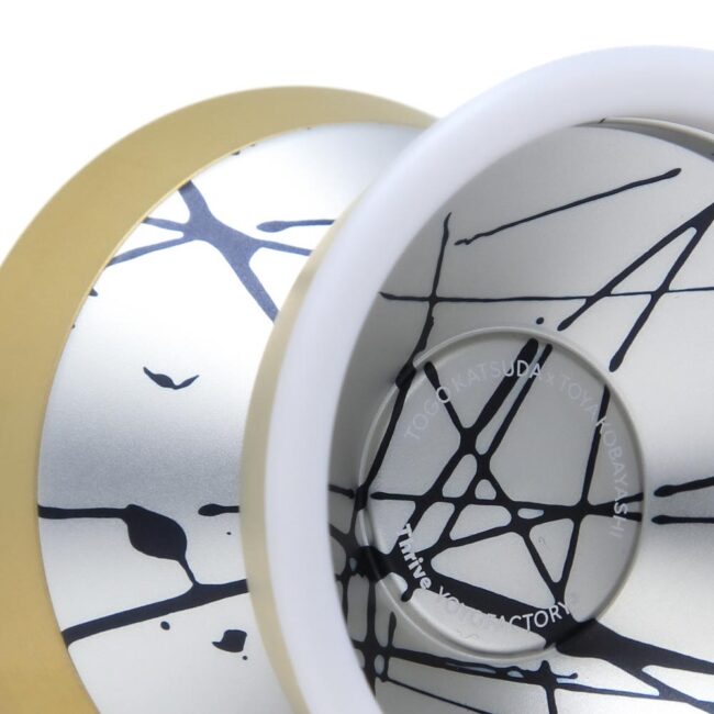 YoYoFactory Togo Katsura Signature Bimetal YoYo with artistic black lines.