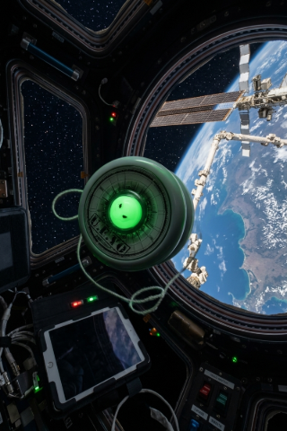YoYoFactory space-themed yo-yo floating outside the International Space Station.